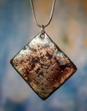 A Double Sided Pendant